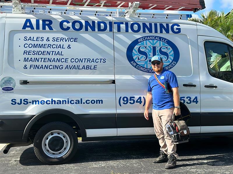 SJS tech in front of van